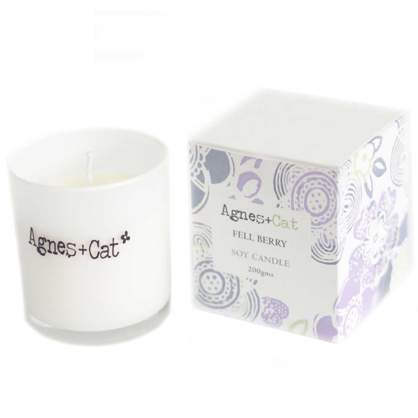 Vela de soja 'Fell Berry' en envase blanco, 200 g, con aroma de frutas silvestres y diseño floral en caja.