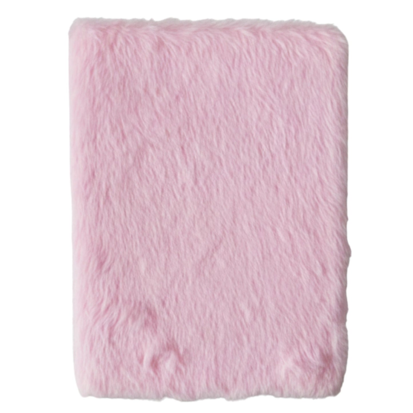 Manta suave de pelaje sintético rosa, ideal para agregar calidez y estilo a cualquier habitación.