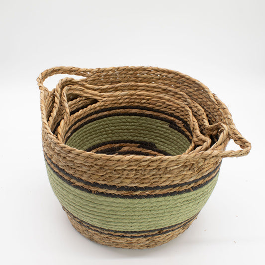 Juego de 3 cestas de pasto marino y algodón en tonos natural, verde y negro, con asas y diseño trenzado artesanal.