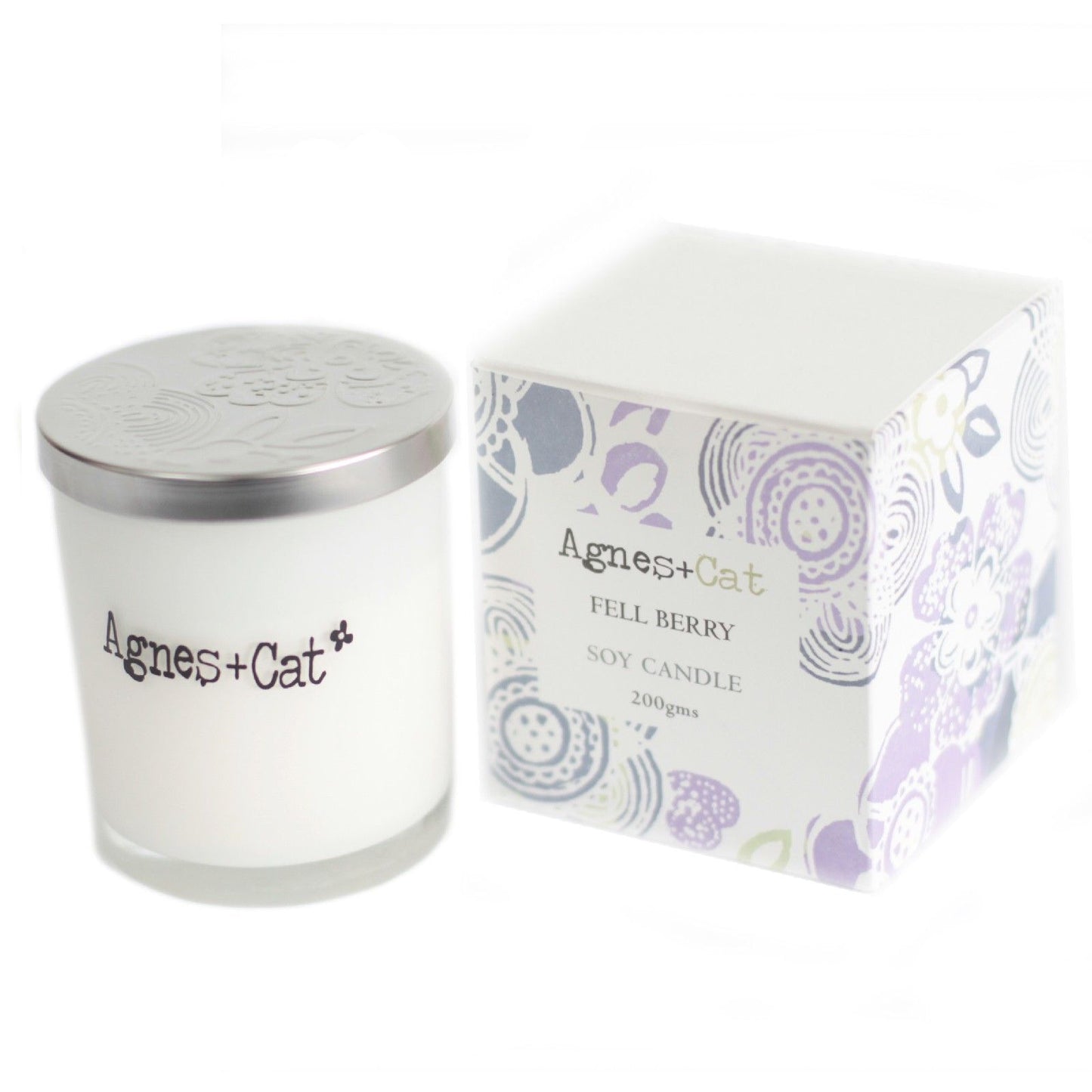 Vela de soja blanca "Fell Berry" de Agnes + Cat, 200g, en envase decorativo con flores.