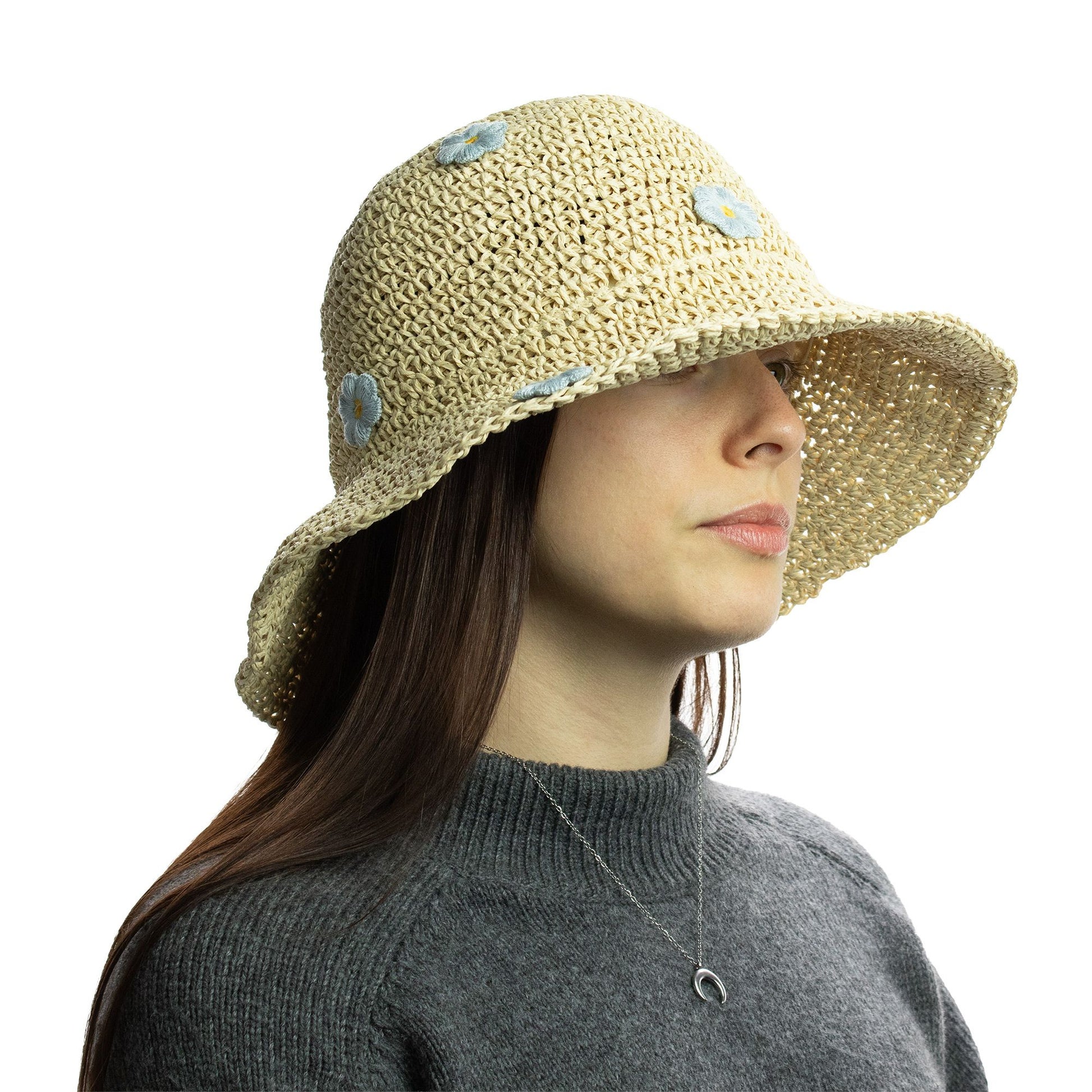 Sombrero de paja beige con flores azules, estilo bohemio, ideal para verano. Perfecto para días soleados.
