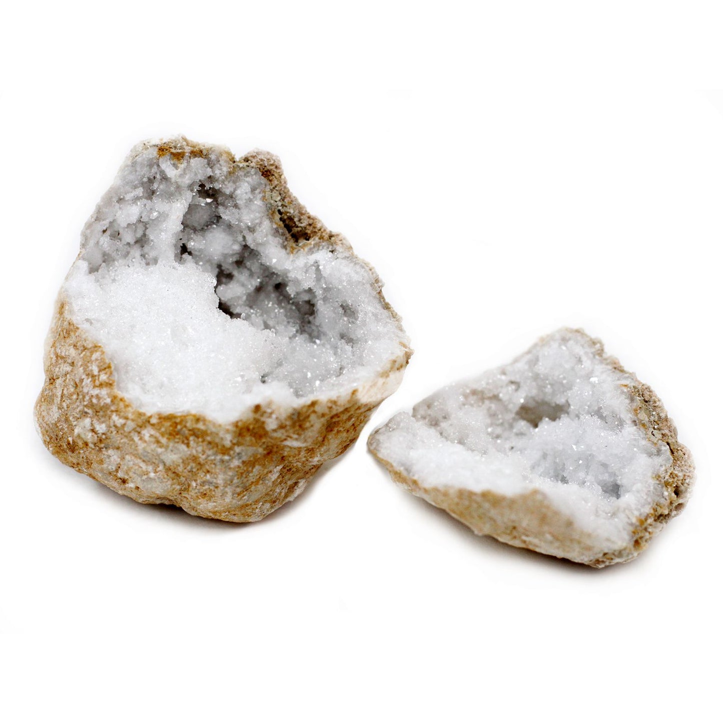 Cristales de sal himalayo, color blanco y beige, con textura natural y facetada, ideales para decoración y cocina.