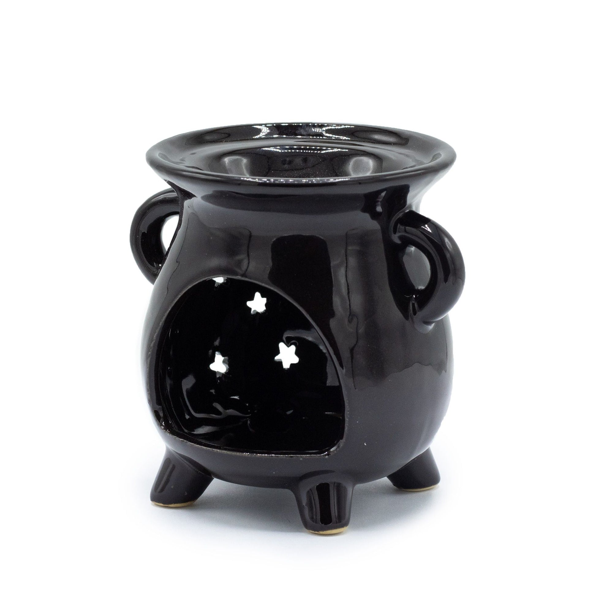 Horno de cerámica negro brillante con estrellas, estilo moderno y decorativo para aromaterapia.