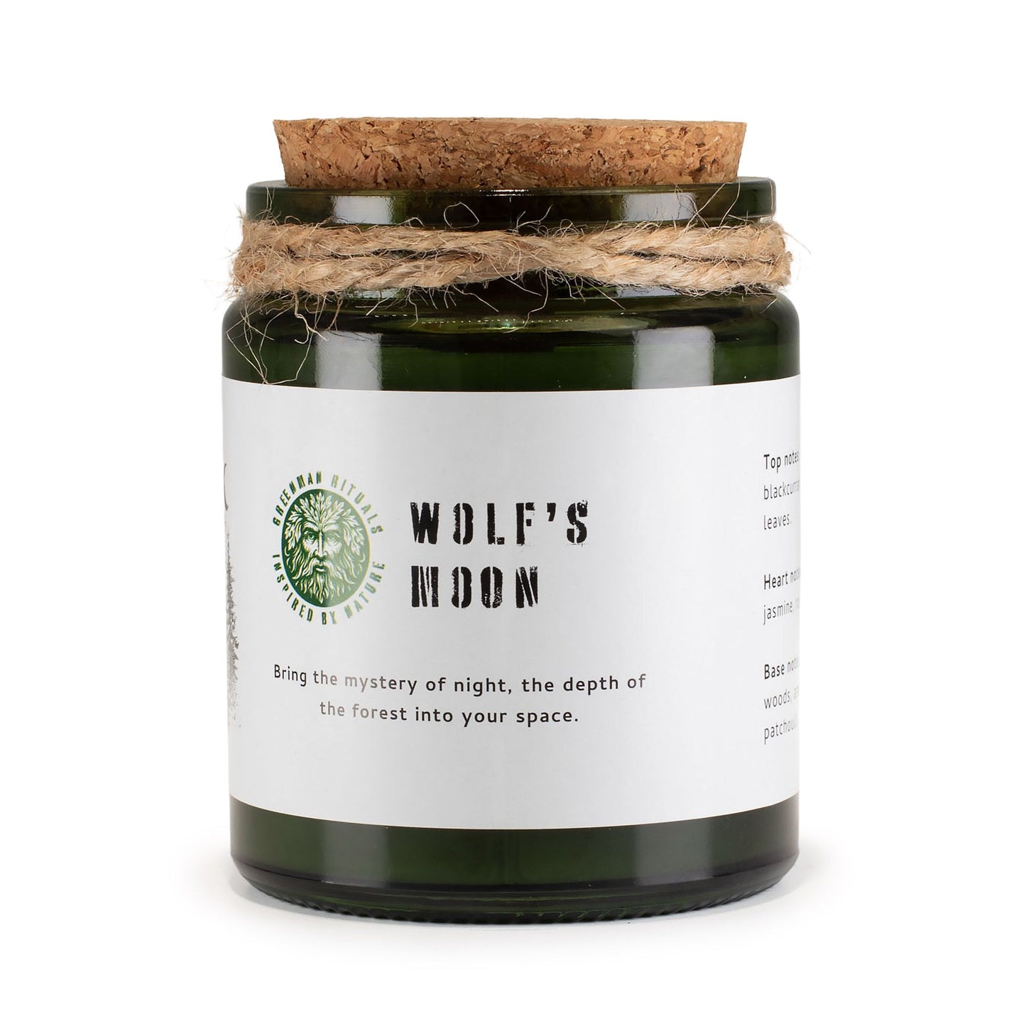 Vela aromática 'Wolf's Moon' en frasco verde, tapón de corcho, con notas de bosque y jazmín. Ideal para ambientar.