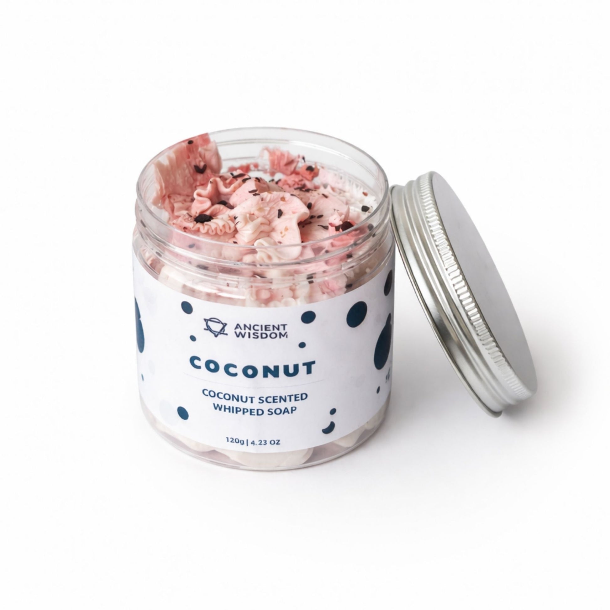Jabón batido de coco, 120g, en frasco transparente con tapa plateada, aroma fresco y textura cremosa.