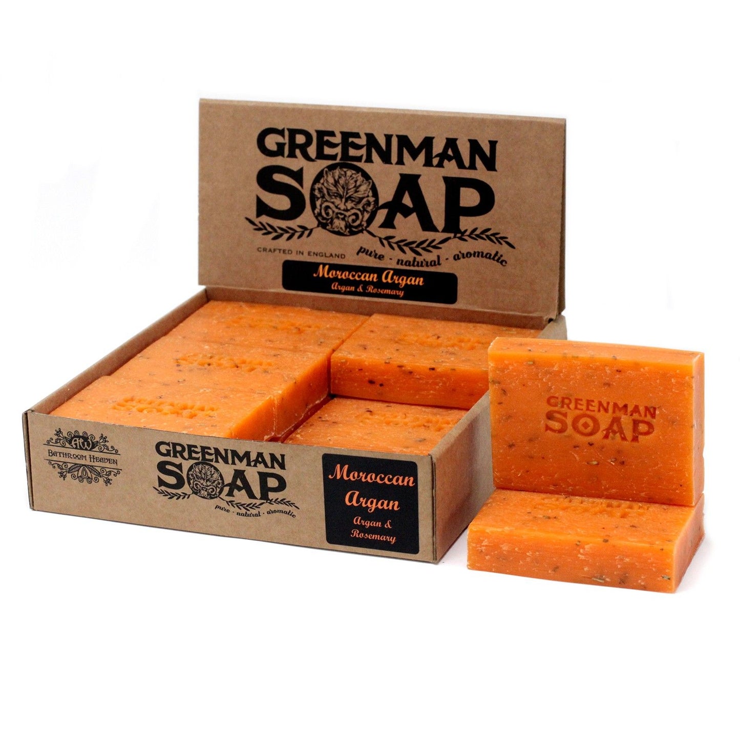 Caja de cartón con jabones artesanales de color naranja, marca Greenman, aroma Argán marroquí y romero. Fondo blanco.