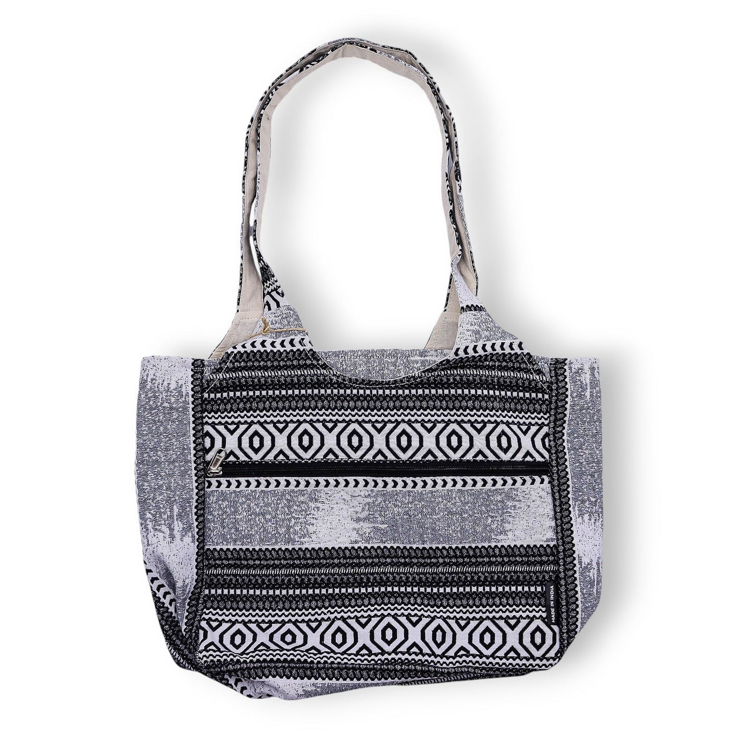 Bolso tote de tela en blanco y negro con diseño geométrico, asas largas y estilo bohemio. Ideal para uso diario.