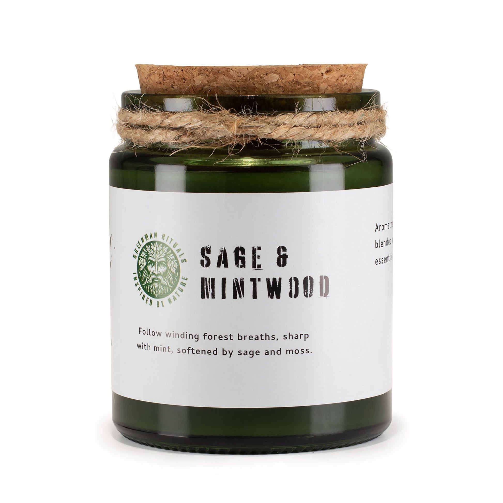 Vela aromática verde con esencia de salvia y menta, tapa de corcho y cuerda decorativa.