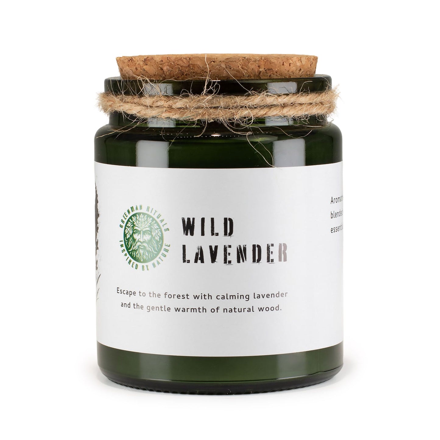 Vela aromática verde en frasco de vidrio con tapa de corcho, lavanda silvestre y algodón natural.