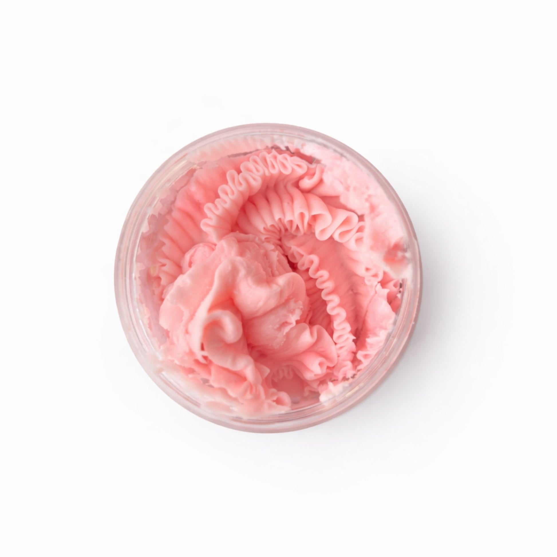 Crema hidratante rosa en frasco transparente, con textura suave y rizada, ideal para el cuidado de la piel.