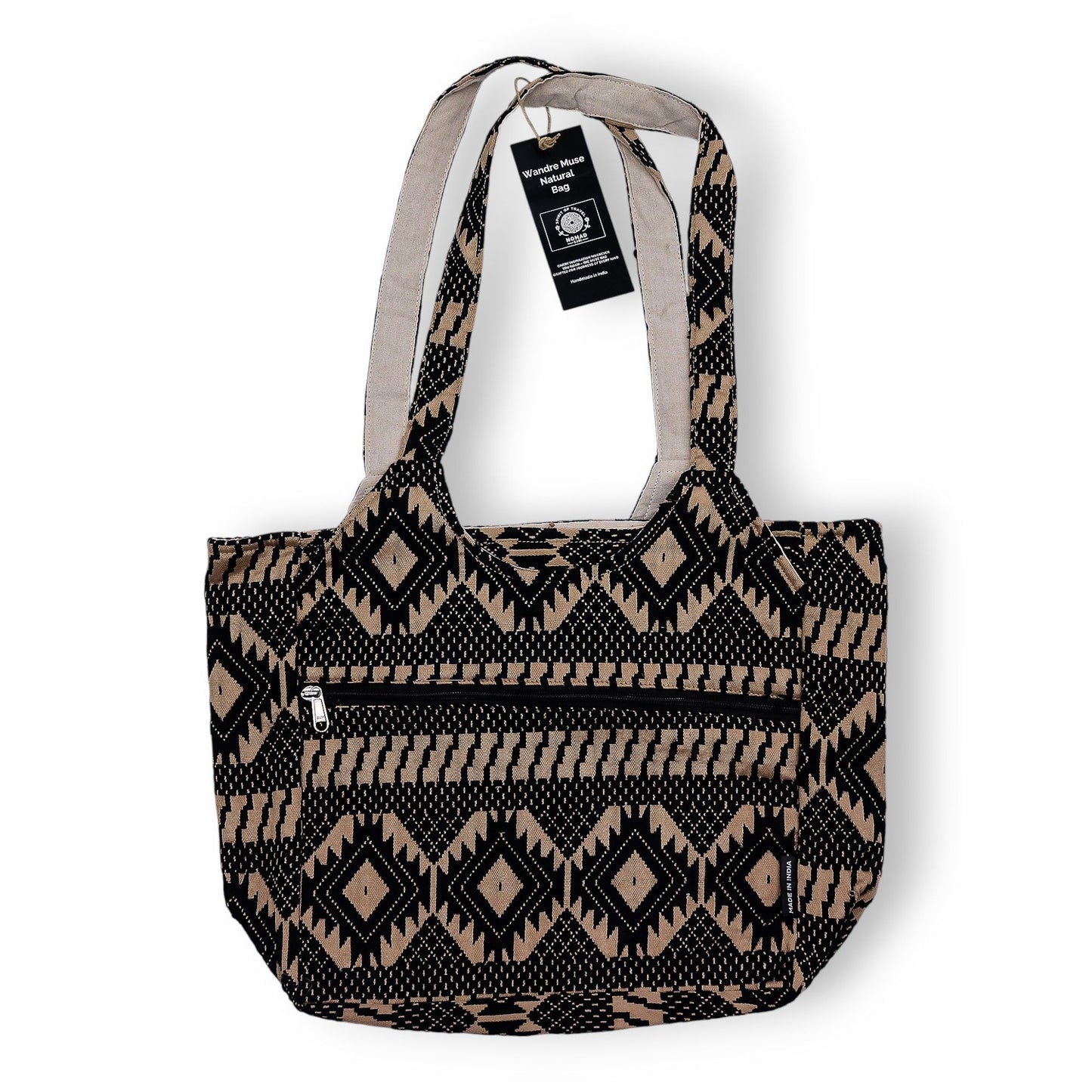 Bolso tote negro y beige, estampado geométrico, hecho de algodón, con bolsillo frontal y asas largas.