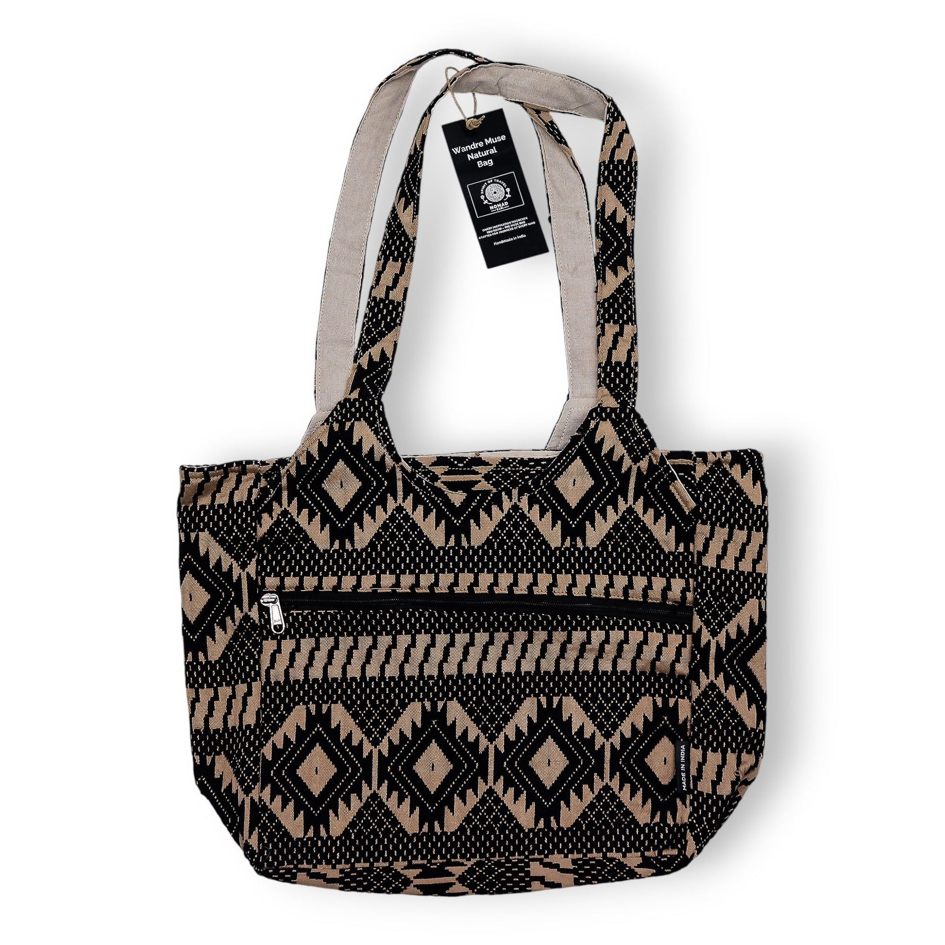 Bolso tote negro y beige, estampado geométrico, hecho de algodón, con bolsillo frontal y asas largas.