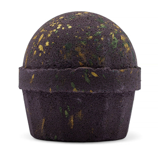 Bomba de baño esfera morada con detalles dorados y verdes, textura suave y diseño elegante.