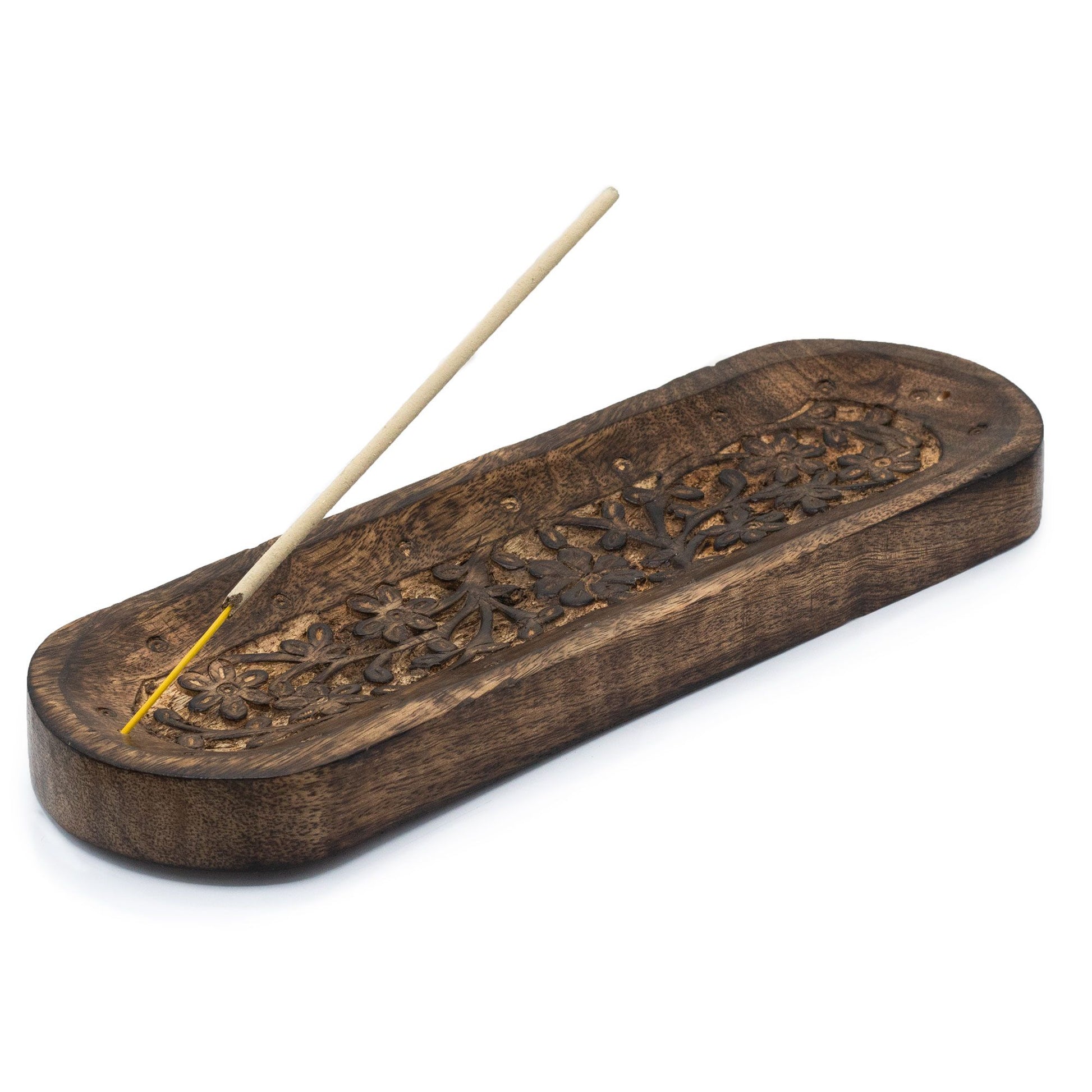 Incensario de madera oscura con tallados florales, estilo bohemio, ideal para decoración y aromaterapia.