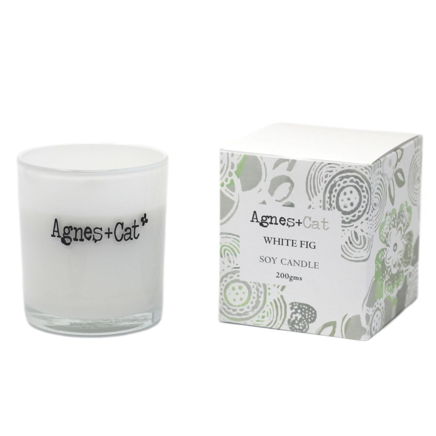 Vela de soja blanca "Higo Blanco" de Agnes+Cat, envase elegante con caja floral. Ideal para decoración y aromaterapia.