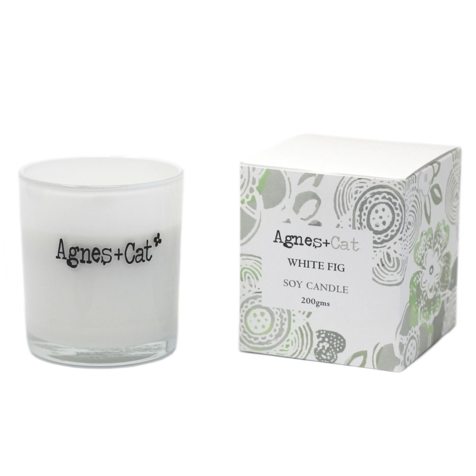Vela de soja blanca "Higo Blanco" de Agnes+Cat, envase elegante con caja floral. Ideal para decoración y aromaterapia.