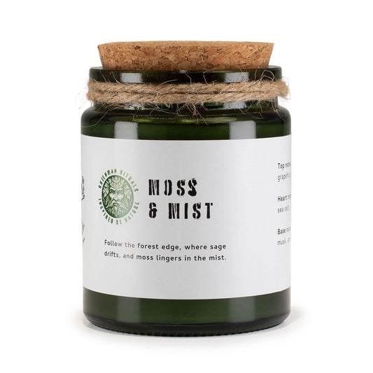 Vela aromática verde en tarro de vidrio, tapa de corcho, aroma a musgo y neblina. Ideal para ambientar y decorar.