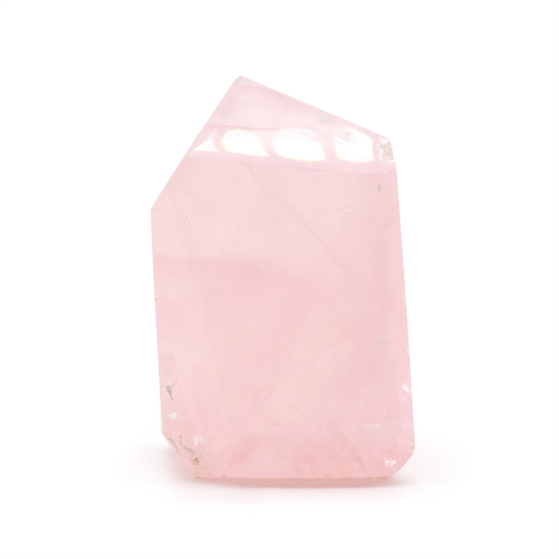 Cristal de cuarzo rosa, forma puntiaguda, color rosa suave, ideal para decoración y terapia energética.