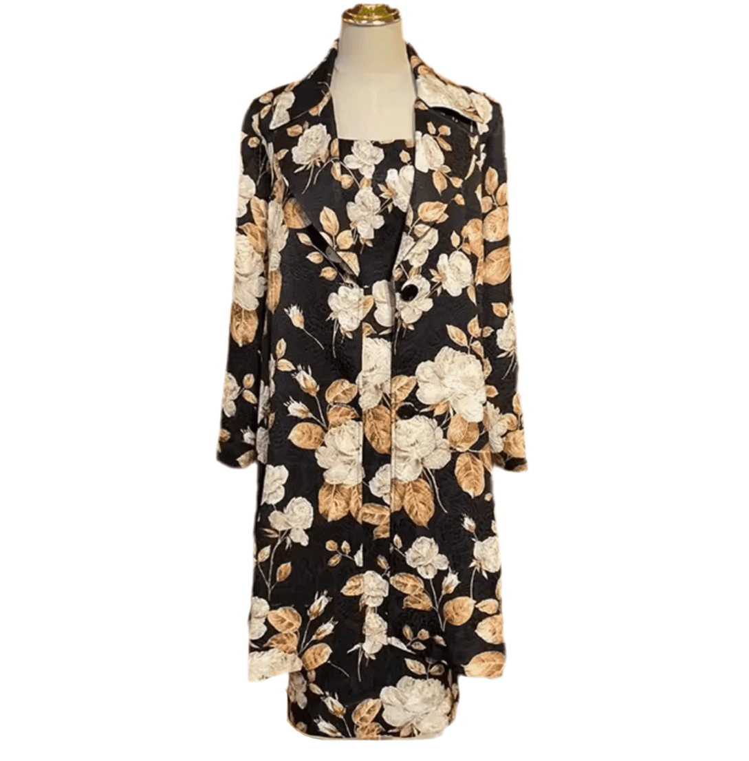 Long-sleeve black brocade overcoat with a beige and white rose floral print, notched lapels, and a single button.