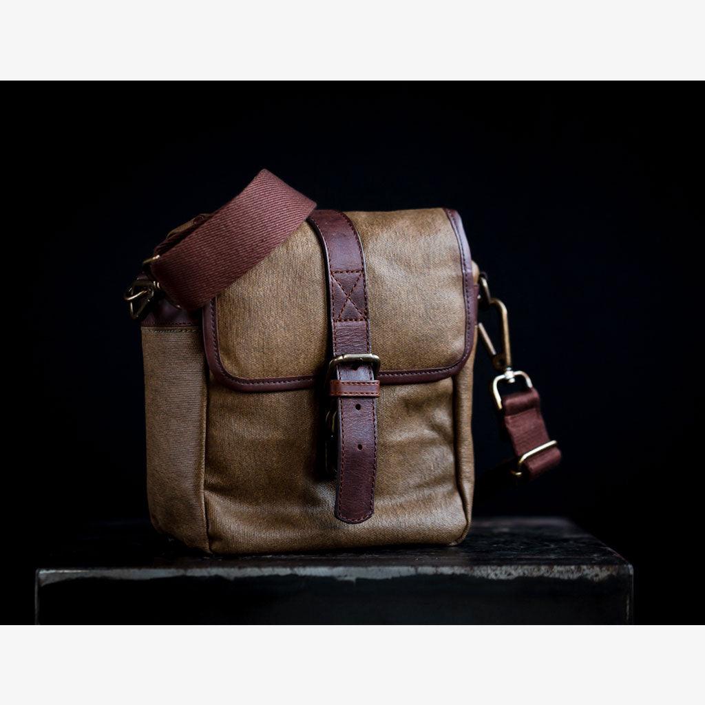 Olive Green Waxed Canvas Camera Bag with front and rear pockets for batteries and cables