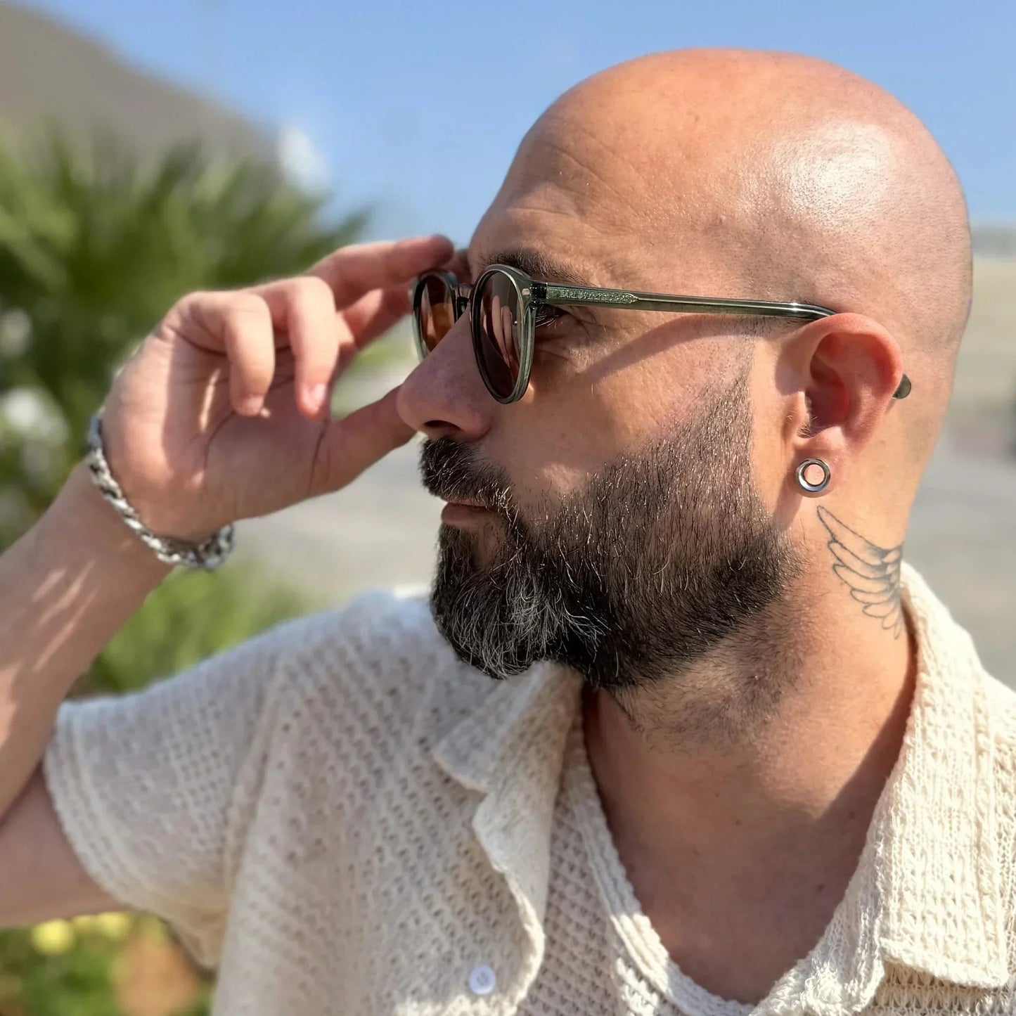 Bolonia · gafas de sol redondas de cristal verde con lentes marrones