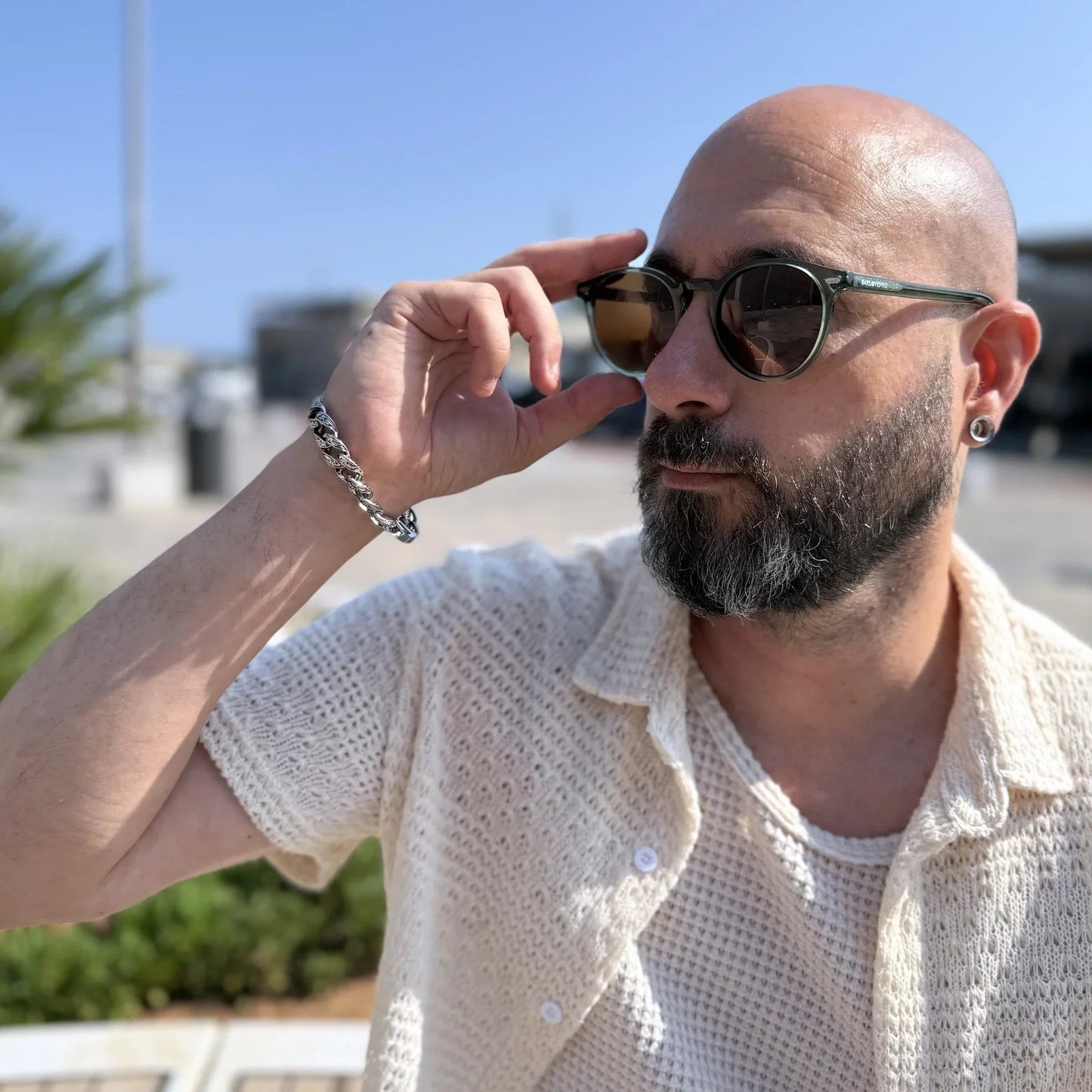 Bolonia · gafas de sol redondas de cristal verde con lentes marrones