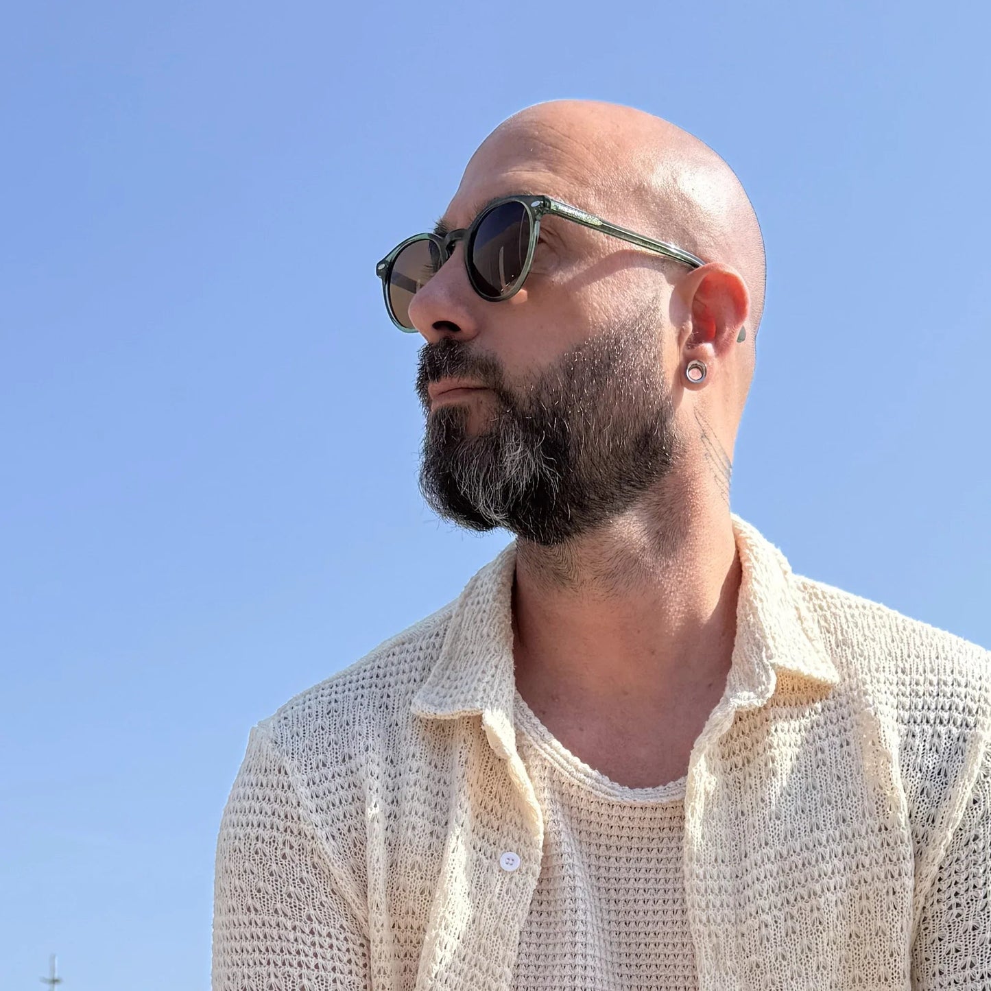 Bolonia · gafas de sol redondas de cristal verde con lentes marrones