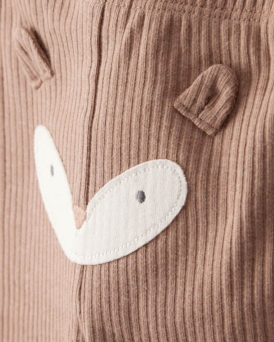 Conjunto dos piezas marrón con dos bodys y pantalón