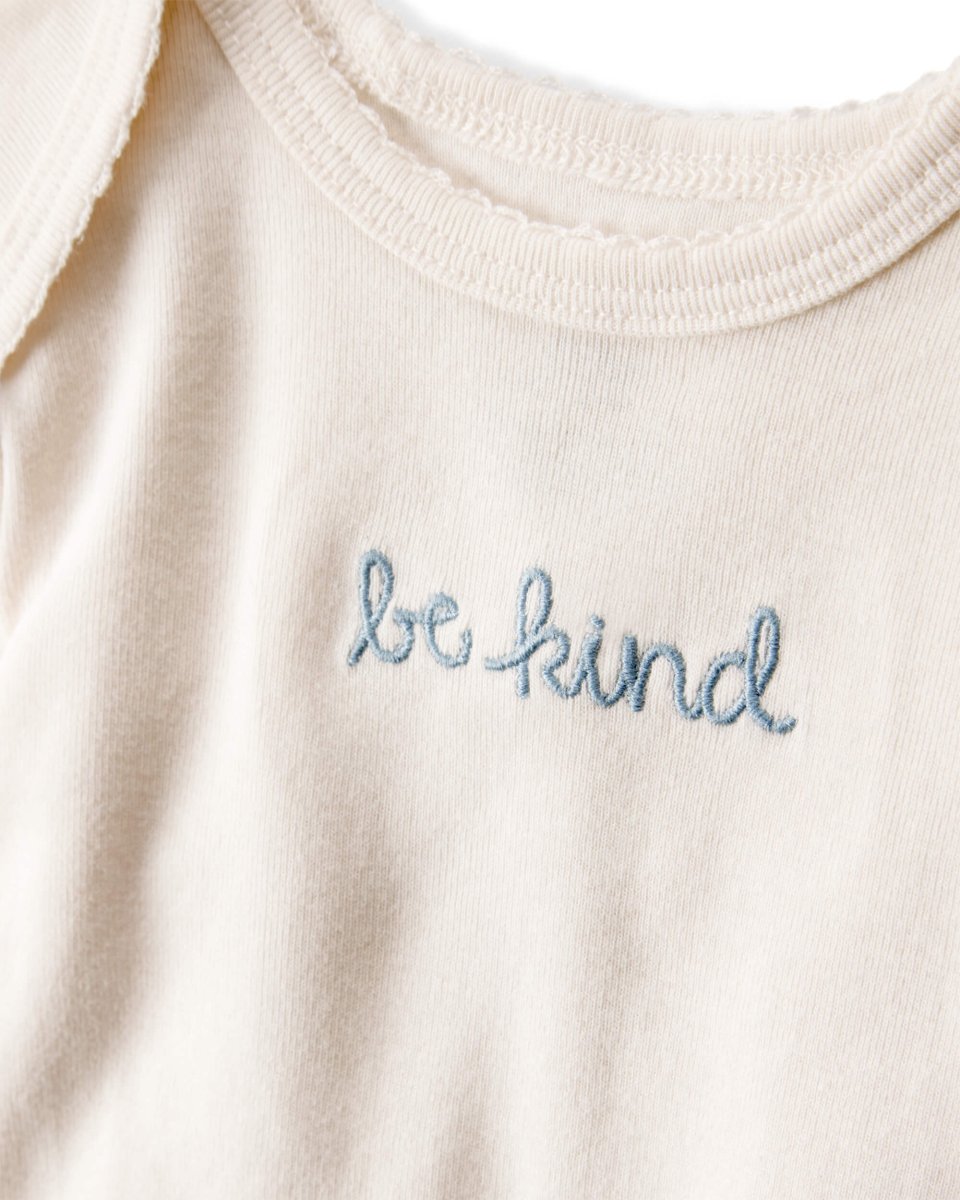 Conjunto 3 piezas con chaleco de lunares y body estampado