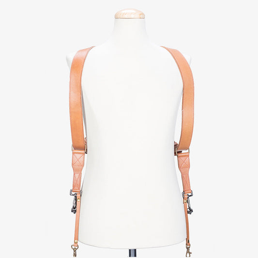 Handmade dual leather camera strap showcasing the back design on a mannequin, highlighting premium quality and craftsmanship.