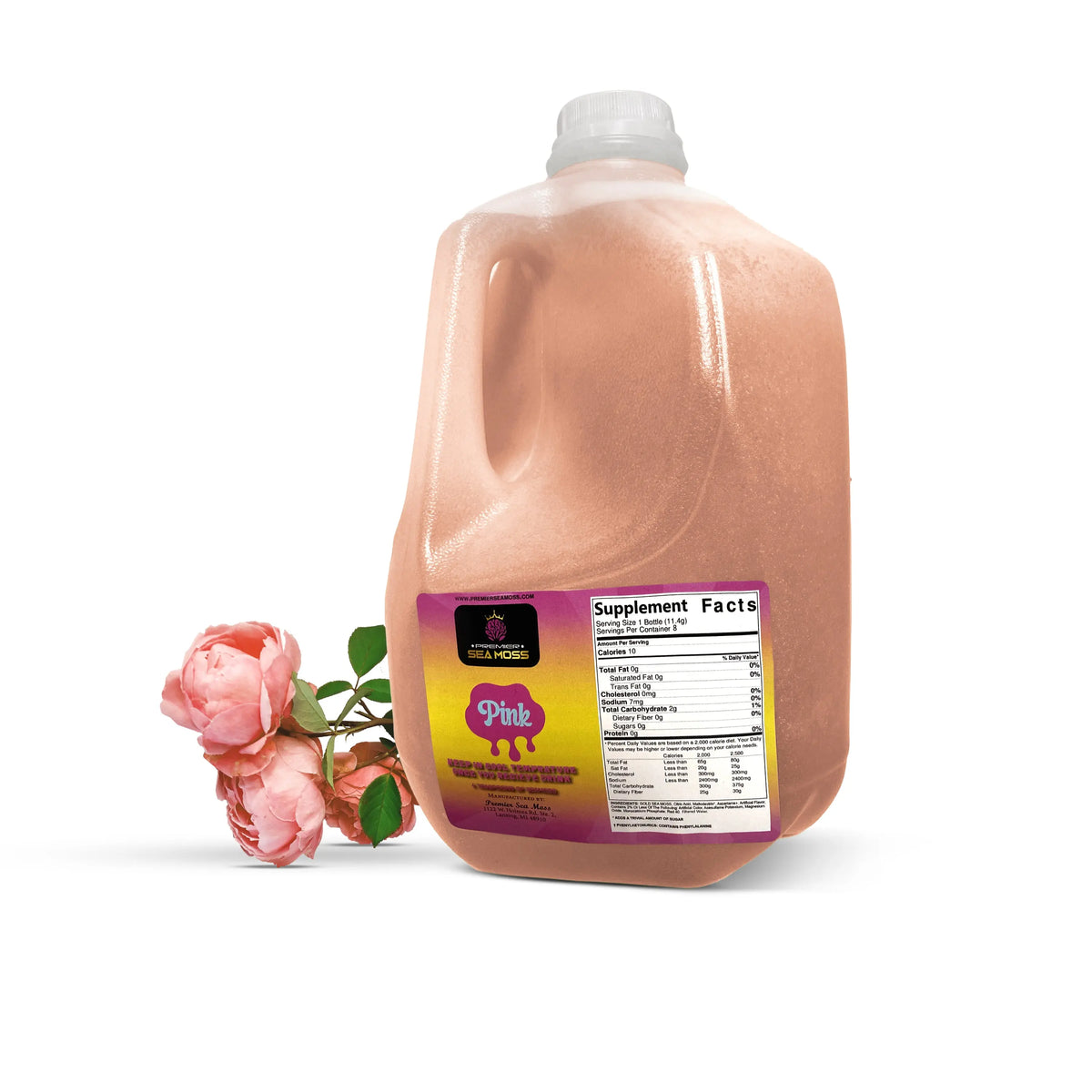 64oz plastic jug of pink sea moss gel next to pink roses on a white background, featuring a supplement facts label.