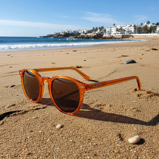 Gulpiyuri · gafas de sol de color naranja cristal