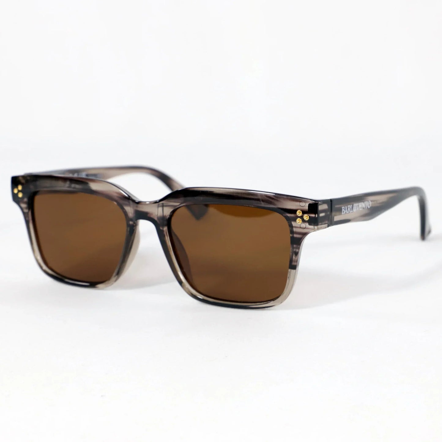 Illetes · gafas de sol de color marrón grisáceo cristalino con lentes marrones