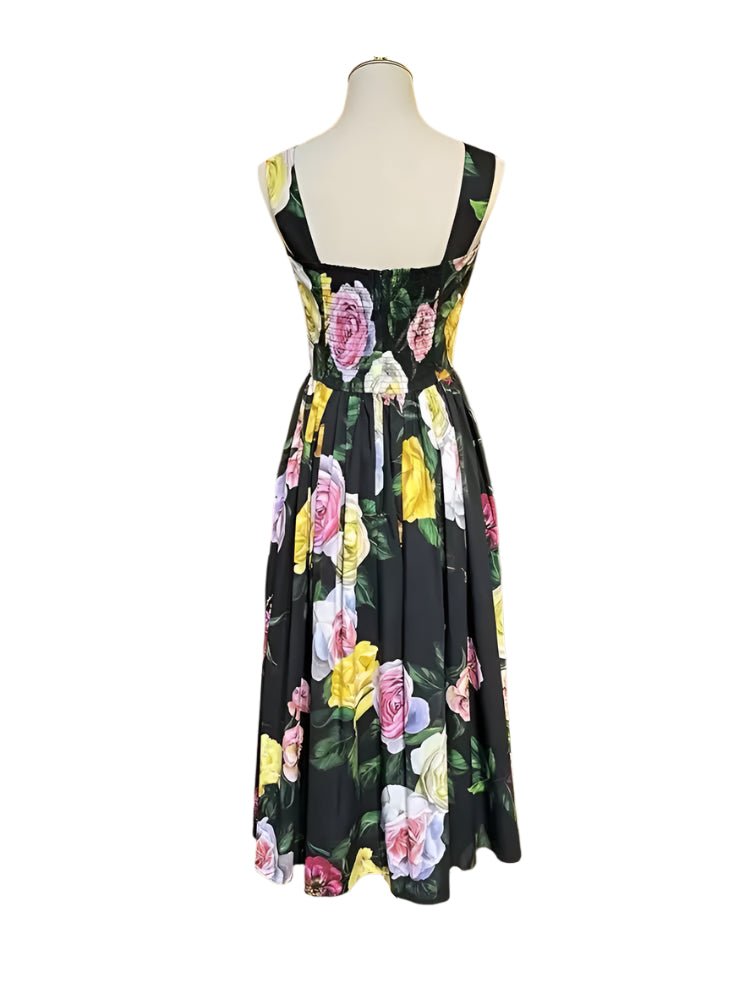 Black floral midi dress with colorful roses, fitted bodice, and flared skirt, perfect for spring and summer occasions.
