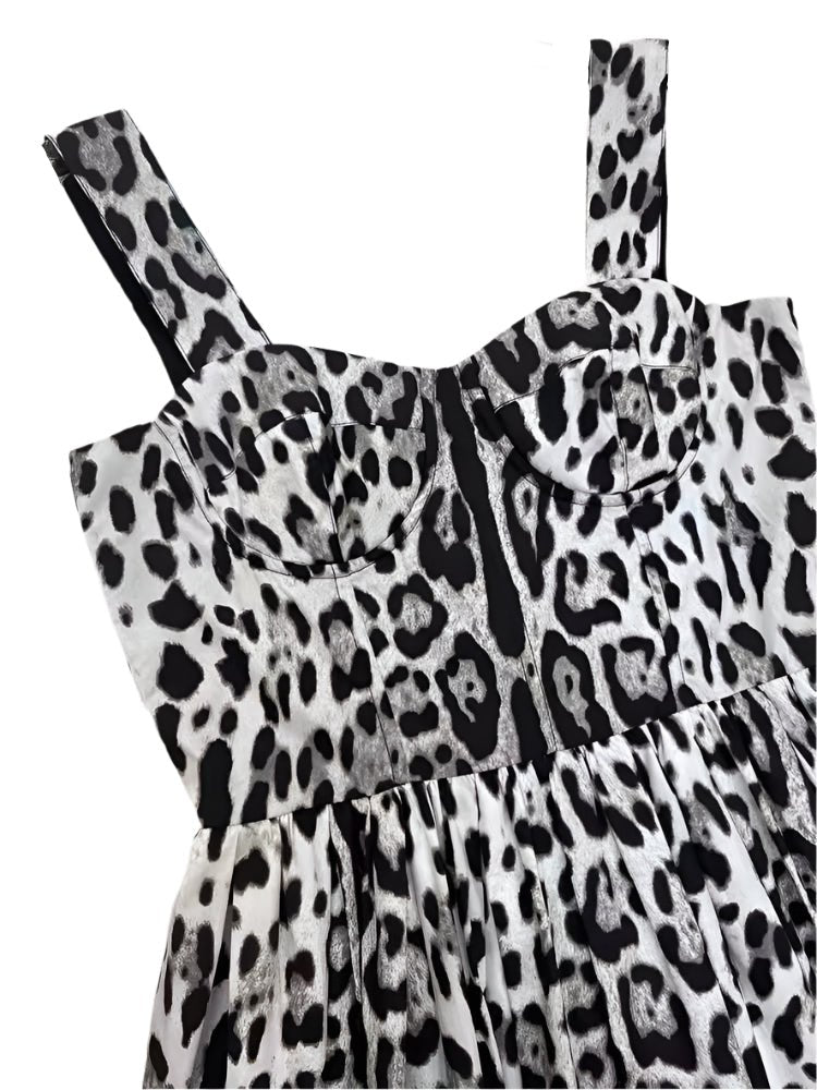 Black and white leopard print dress with a sweetheart neckline and adjustable straps, perfect for summer outings.