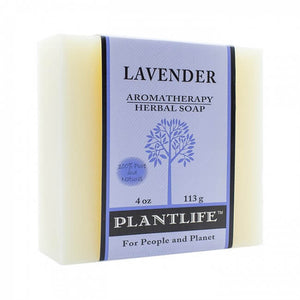 A rectangular bar of cream-colored soap wrapped in a lavender label with text, a tree illustration, and Plantlife logo.