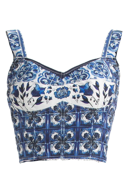 Blue and white cotton corset-style top featuring a traditional Mediterranean Majolica tile and floral print.