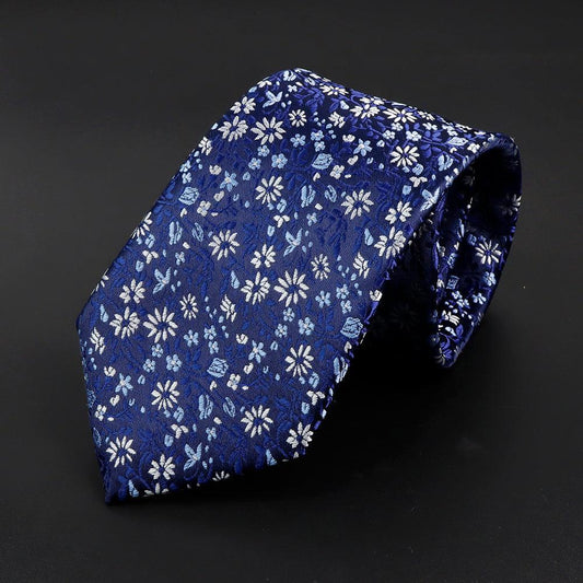 Margaritas · corbata azul brillante con flores blancas