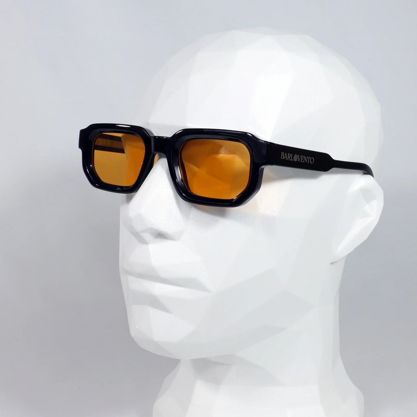 Médano · gafas de sol negras llamativas con lentes naranjas