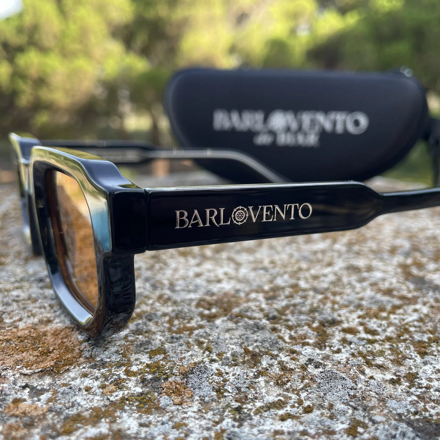 Médano · gafas de sol negras llamativas con lentes naranjas