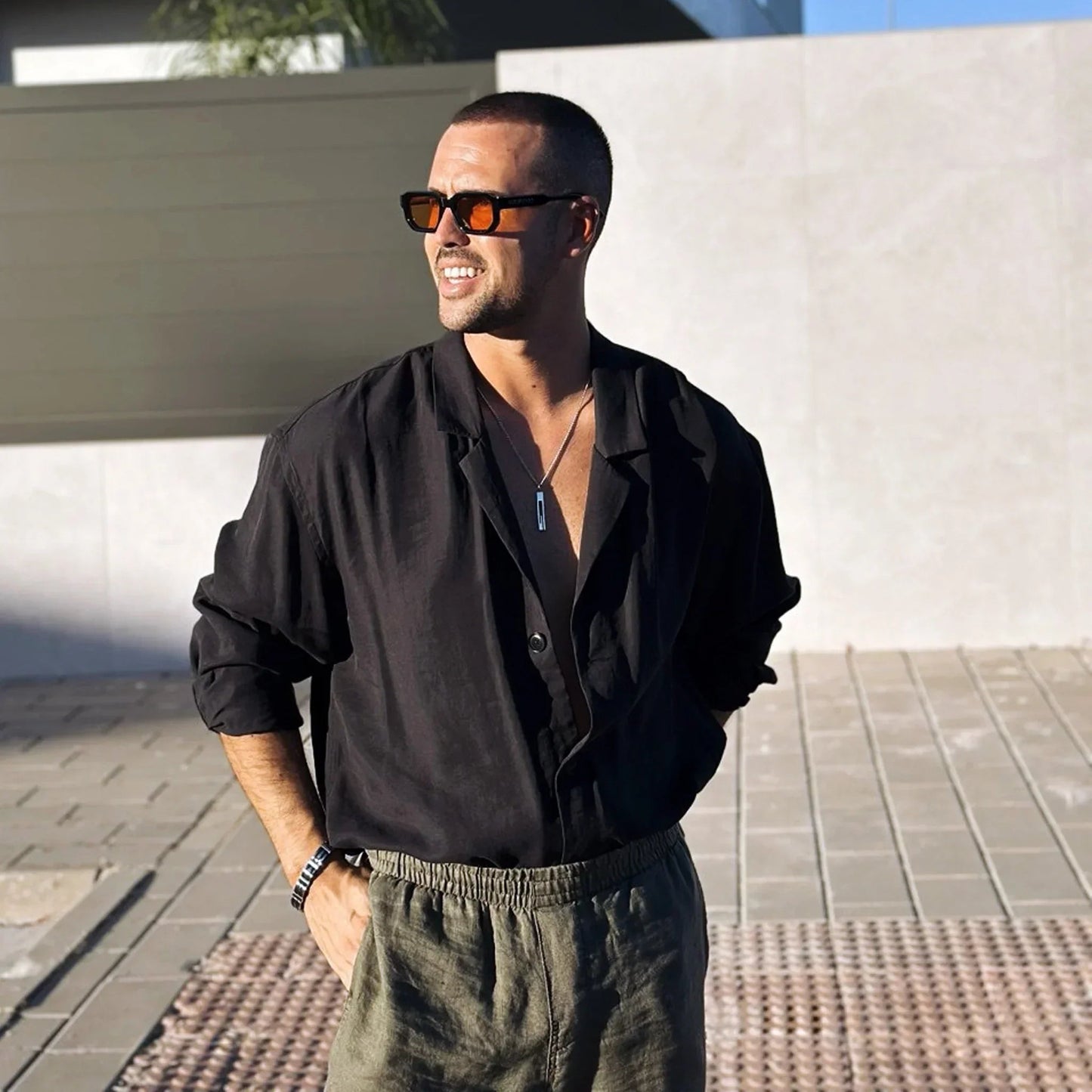 Médano · gafas de sol negras llamativas con lentes naranjas