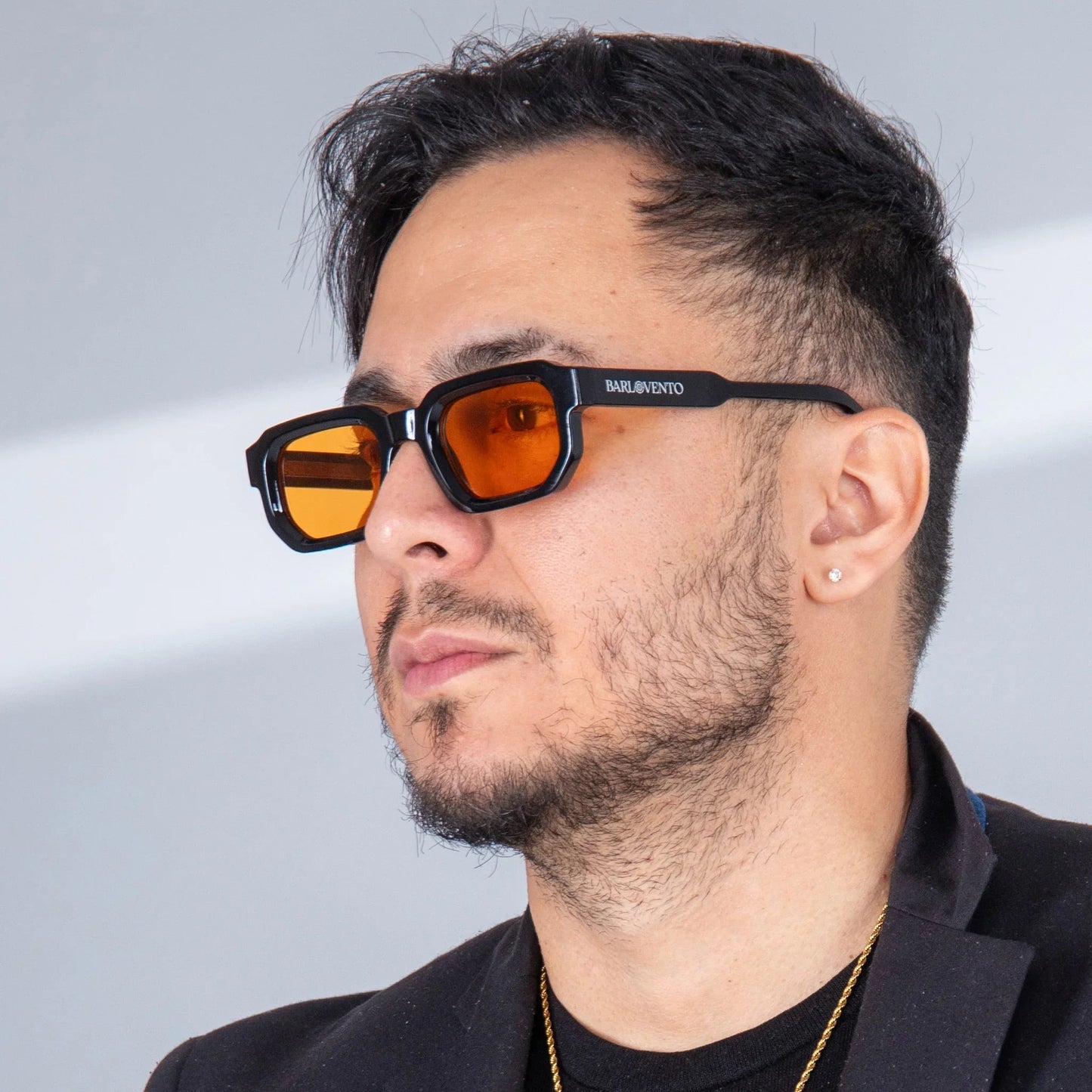 Médano · gafas de sol negras llamativas con lentes naranjas