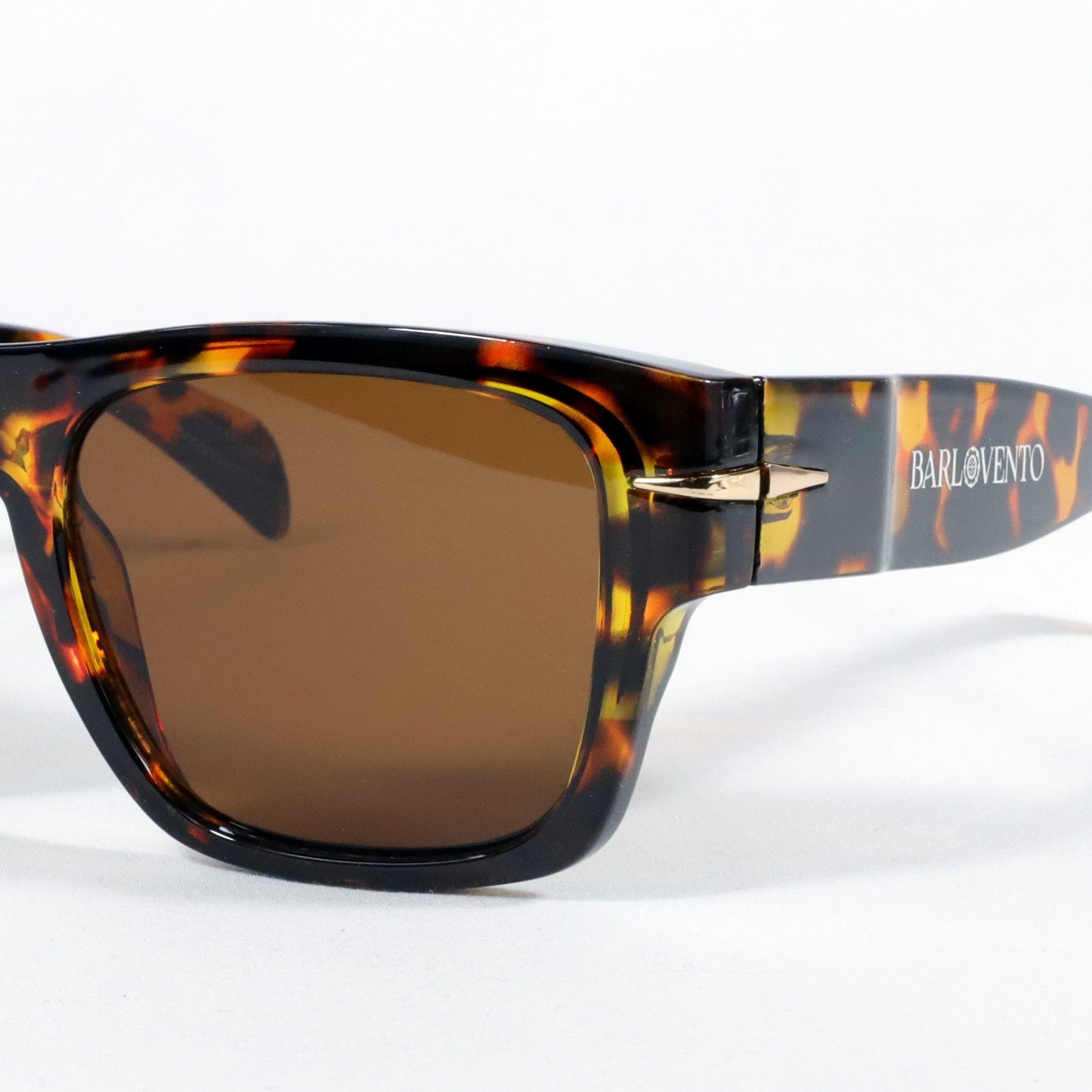 Náufragos · gafas de sol retro premium rojas con forma de llama y lentes marrones