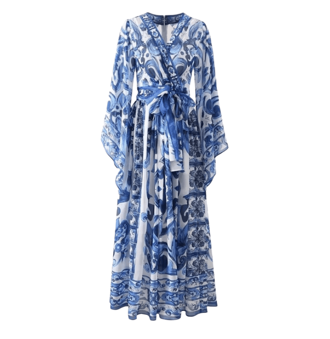 Blue floral maxi dress with bell sleeves and a waist tie, crafted from lightweight chiffon fabric. Perfect for summer.