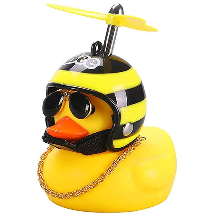 Yellow rubber duck with black helmet, sunglasses, gold chain, and propeller; quirky bath toy for kids and adults.