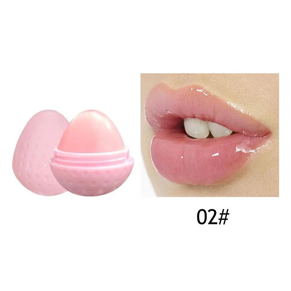 Pink egg-shaped lip balm container and close-up of glossy pink-tinted lips on a white background labeled 02#.