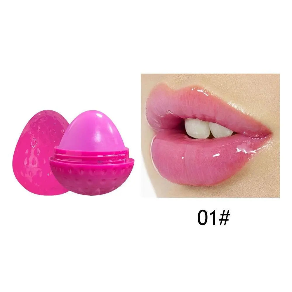 Pink egg-shaped lip butter container beside lips coated in a glossy, pink hydrating balm, labeled 01#.