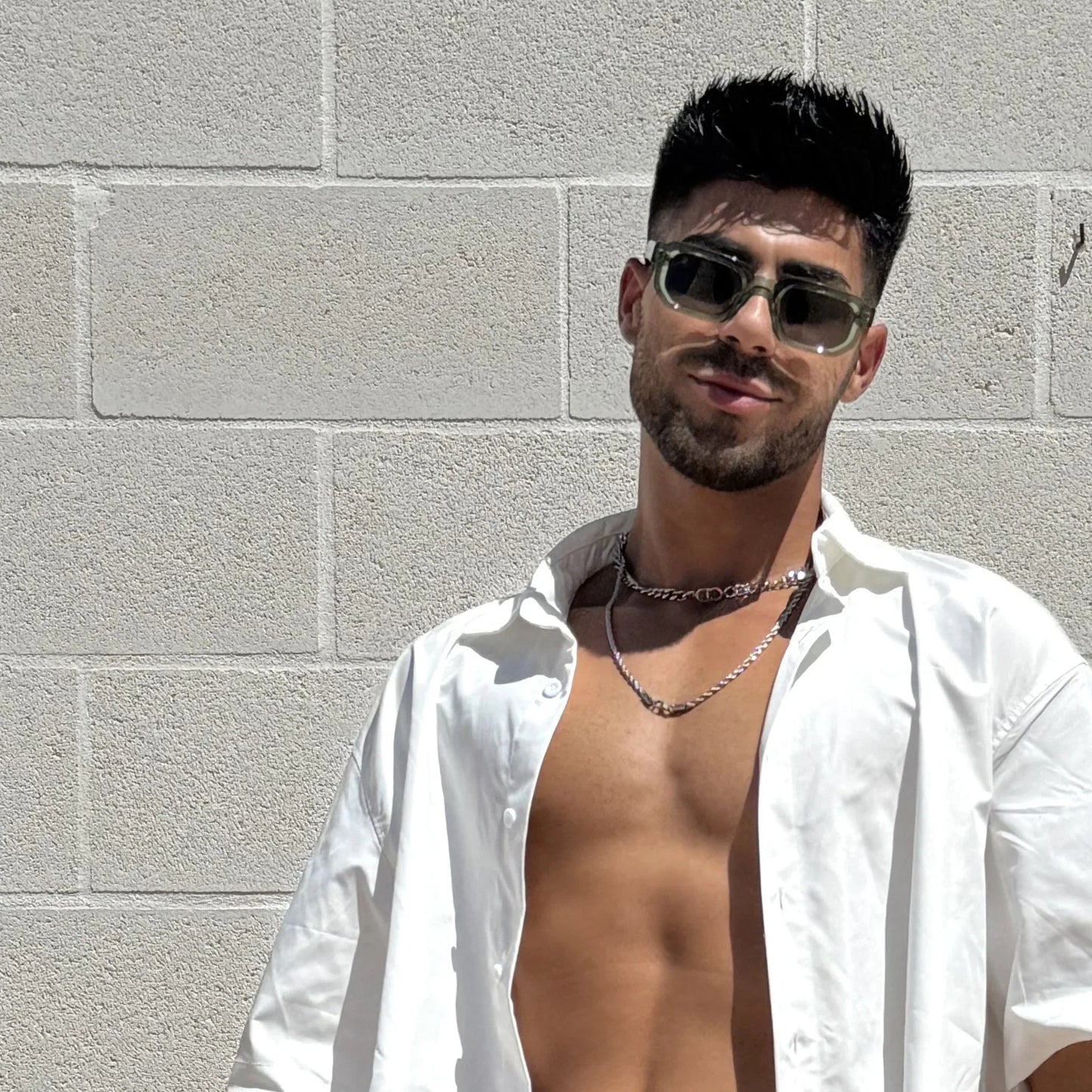 Portet · gafas de sol verdes llamativas con lentes negras UV400