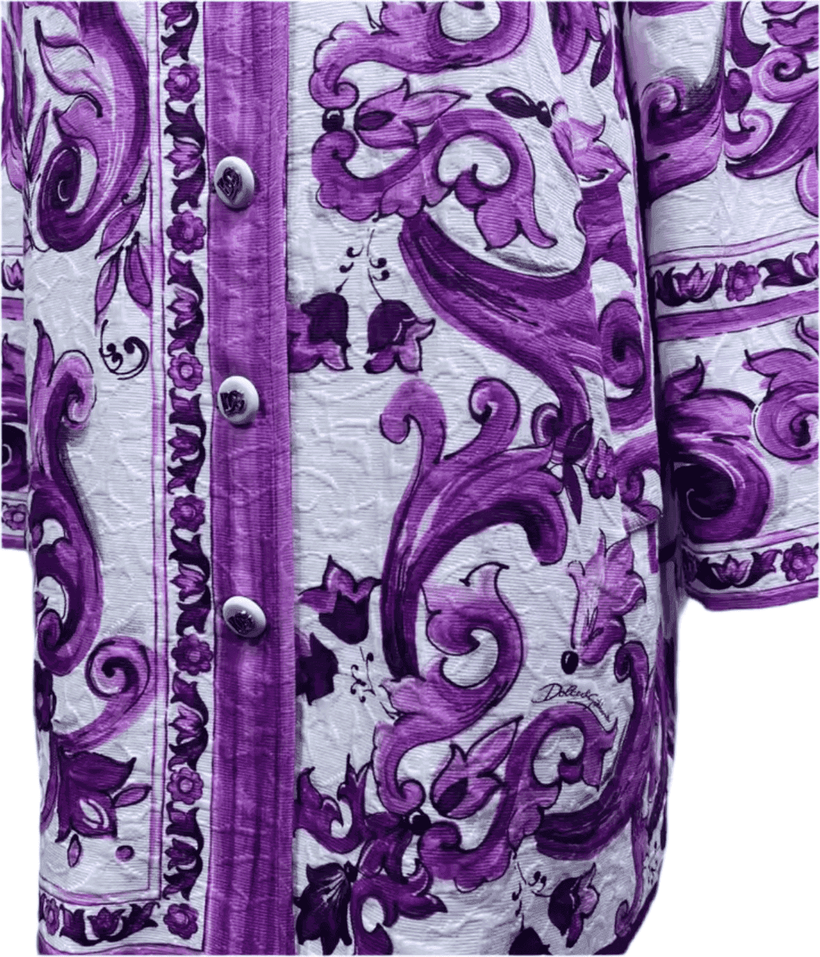 Long jacket in white brocade featuring a vibrant purple Majolica print, ornate swirling patterns, and button closure.