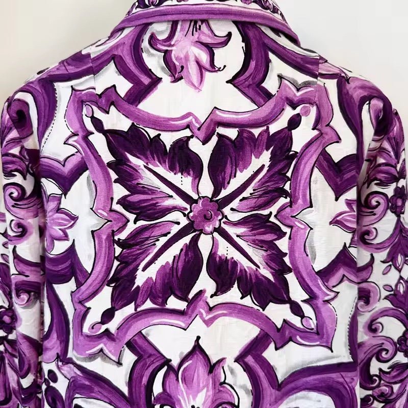 Long-sleeve jacket with a purple and white Majolica floral print and ornate brocade-style pattern.